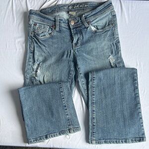 Blue Distressed Boot Cut Jeans